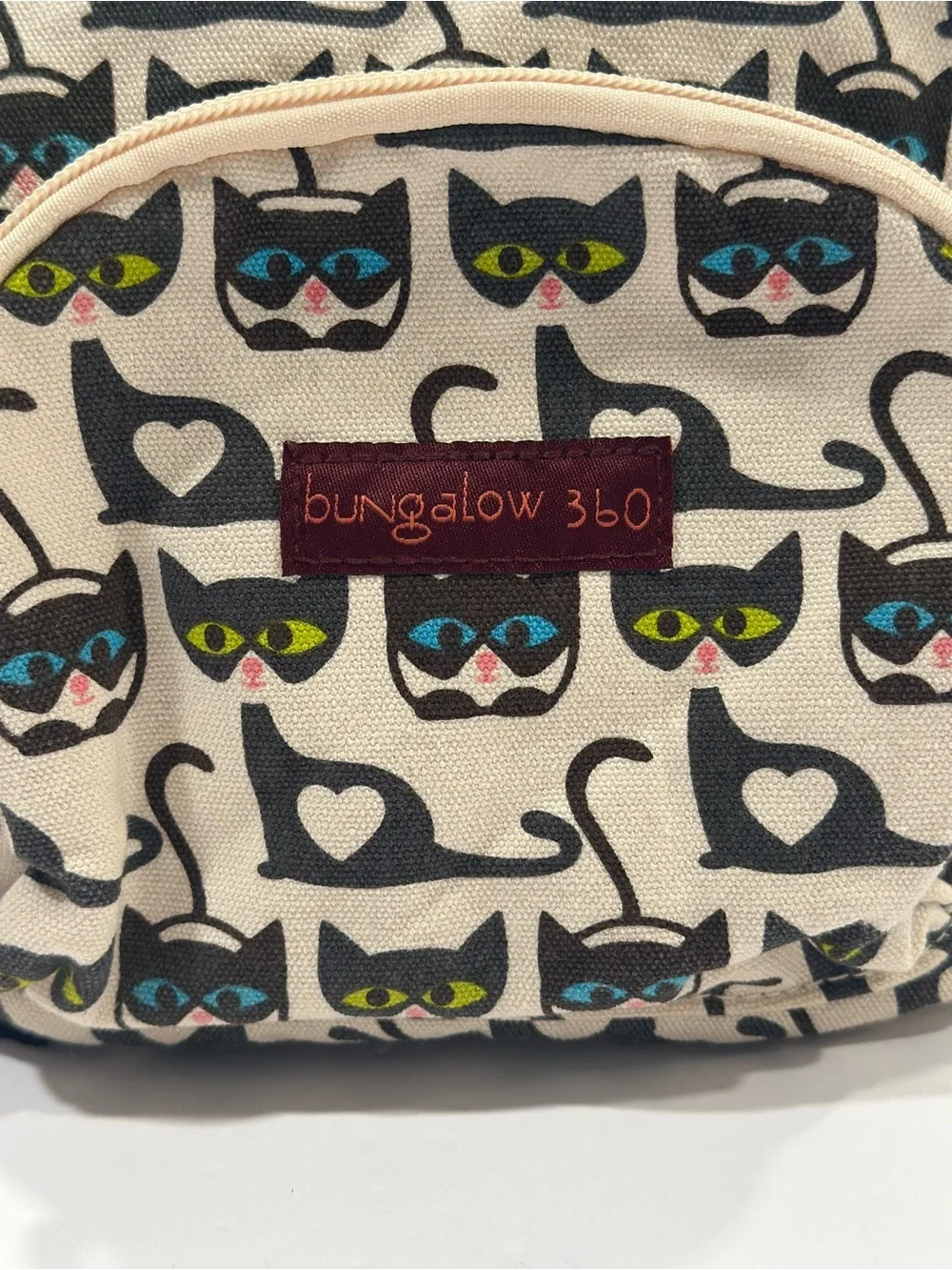 bungalow 360 Cream Mini Backpack with Black Cat Print and Colorful Eyes